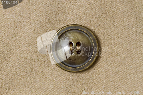 Image of Big button and fabric background