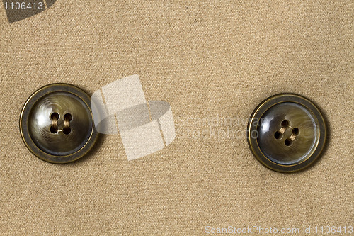 Image of Two big buttons and fabric 