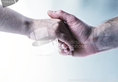 Image of hands touch background