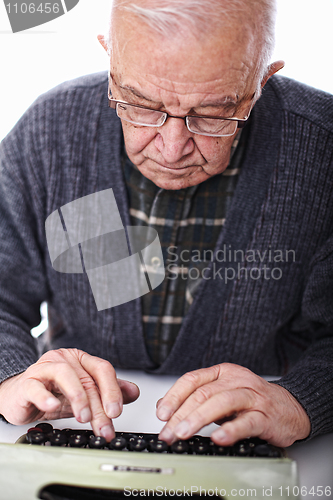 Image of senior at typewriter