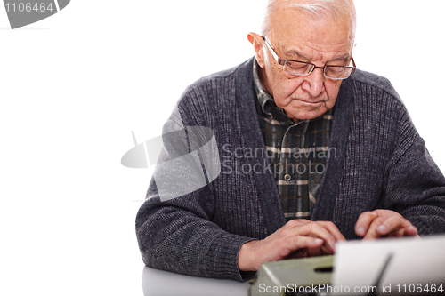 Image of old man and typewriter