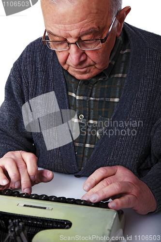 Image of old man and typewriter