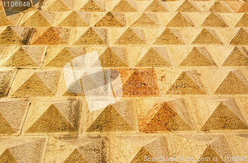 Image of A close-up section of a sandstone wall  tiles