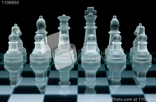 Image of Macro shot of glass chess set against a black background