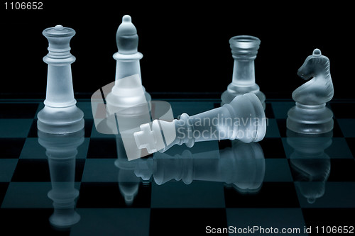 Image of Macro shot of glass chess pieces against a black background