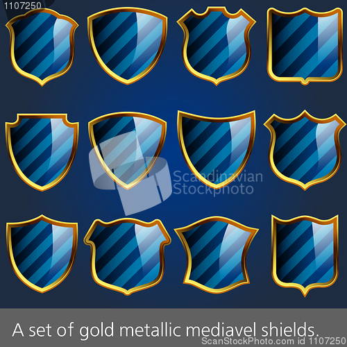 Image of A set of gold metallic mediavel shields.