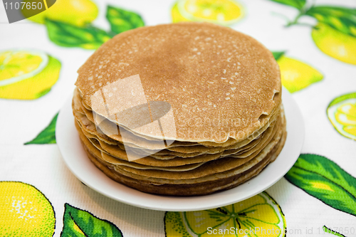 Image of Hill from pancakes on white plate