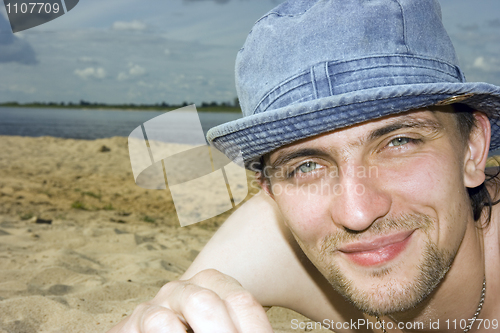 Image of man on a beach