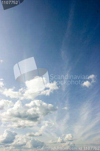 Image of The dark blue sky with clouds