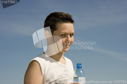Image of The girl with a water bottle