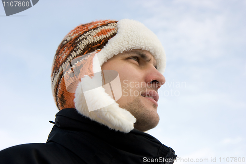 Image of The man in a winter cap