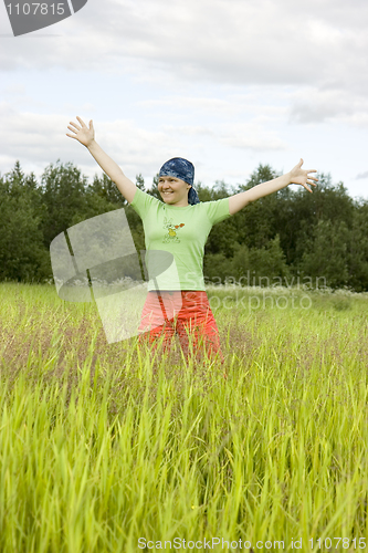 Image of The girl in a grass