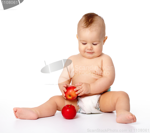 Image of Little child with apple