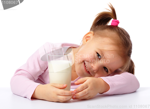 Image of Little girl with a glass of milk