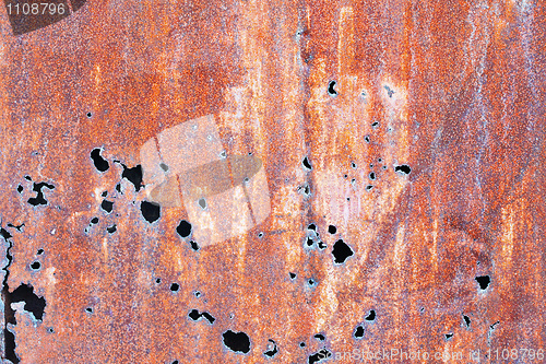 Image of Rusty steel sheet with holes