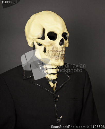 Image of Portrait of death in business suit
