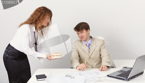 Image of She treats colleague sandwich
