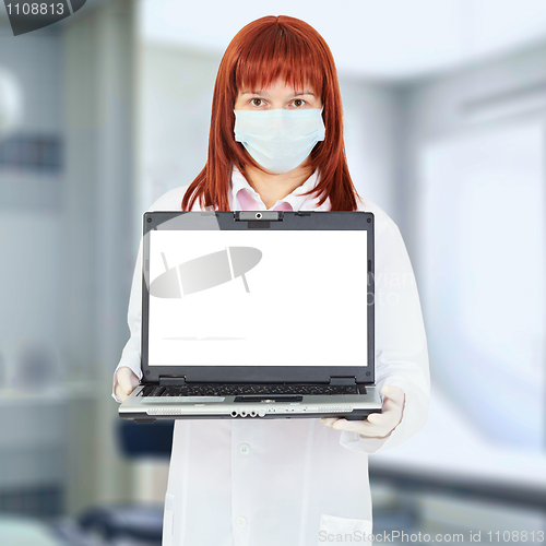 Image of Nurse with computer in hospital