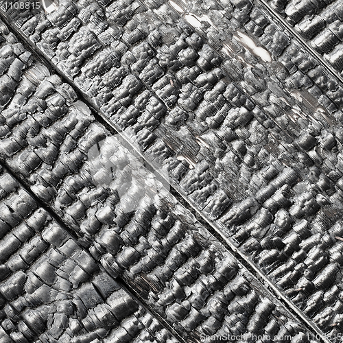 Image of Wooden wall blackened after fire - texture