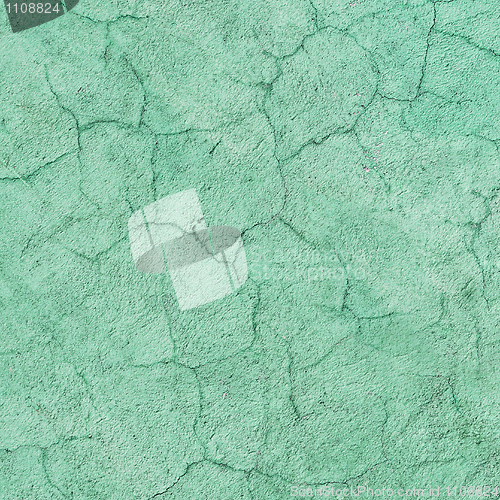 Image of Texture of green concrete wall with cracks