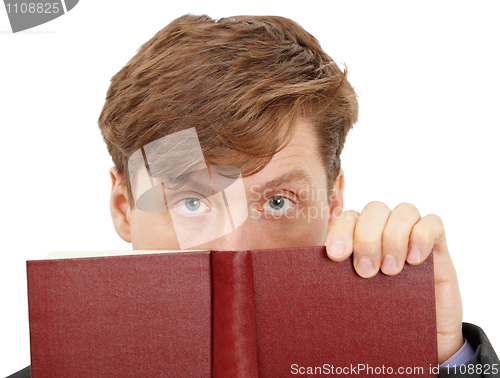 Image of Person looks over the book