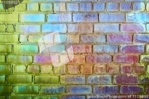 Image of Rough brick wall iridescent colors of rainbow
