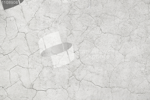 Image of Light concrete wall with cracks