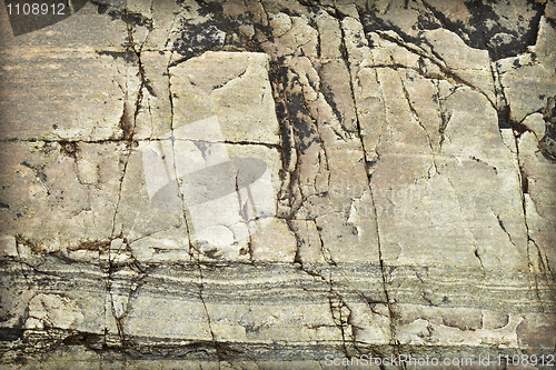 Image of Natural stone with stains and cracks