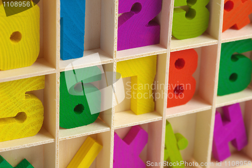 Image of Color wooden toy figures in box