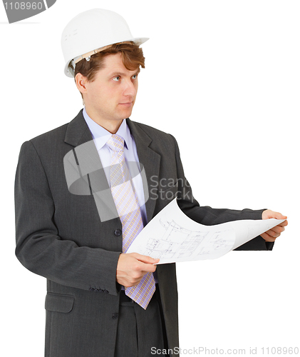 Image of Engineer in white safety helmet with drawing