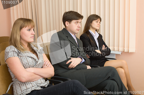 Image of Group of skeptical businessmen