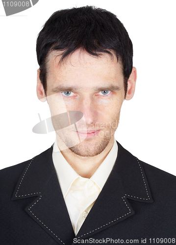 Image of Portrait of serious man in black suit