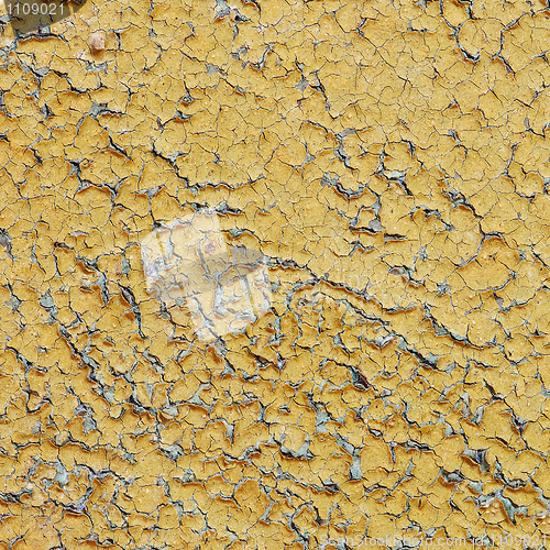 Image of Yellow aged wall with cracks