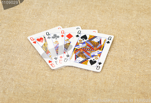 Image of Playing cards - queens of different suits