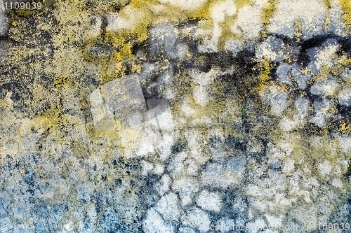 Image of Multi-colored dirt on old concrete wall