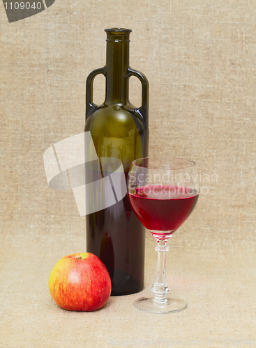 Image of Still life with green bottle, apple and glass on canvas