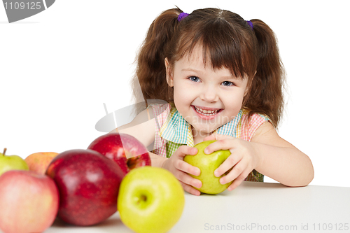 Image of Happy child with apples - sources of vitamins