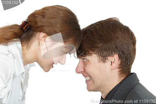 Image of Serious confrontation between men and women