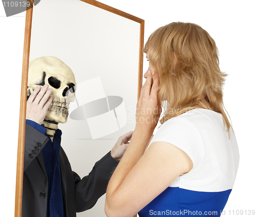 Image of Girl looks into false mirror