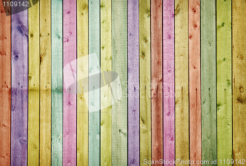 Image of Wooden wall painted in colors of rainbow