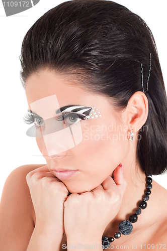 Image of Woman with color face art