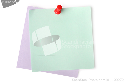 Image of Blank paper notes with red pushpin 