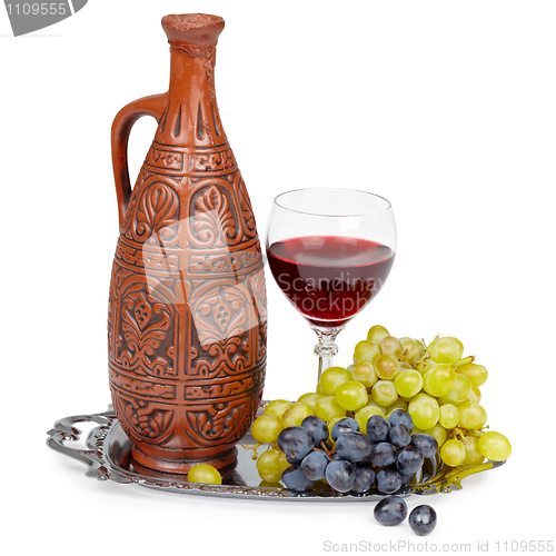 Image of Still life - clay jug and glass of red wine