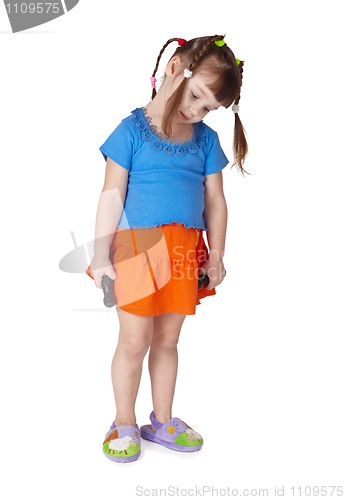 Image of Child tired doing sport exercises with dumbbells