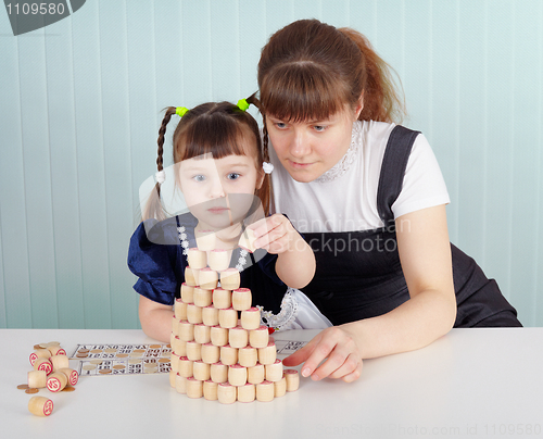 Image of Child and teacher played with lotto