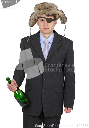 Image of Funny man in fur hat with a bottle on a white background