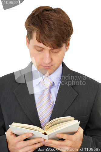 Image of Young man reading book