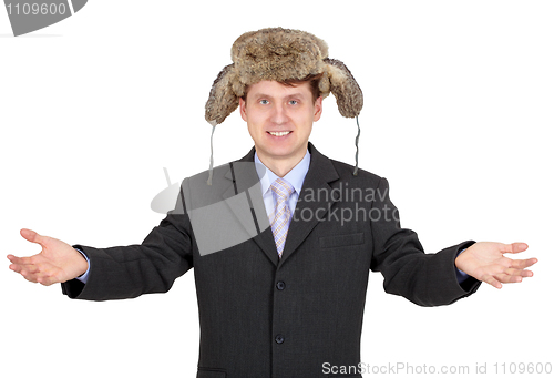 Image of Hospitable funny man with a fur hat
