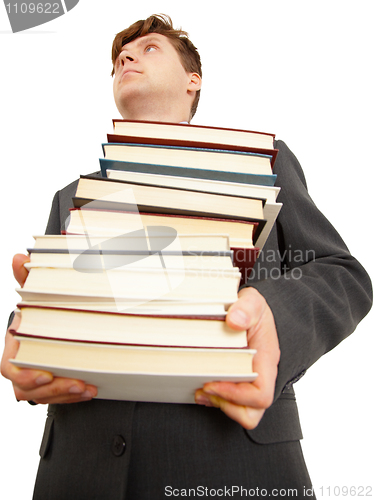 Image of People holding large number of books