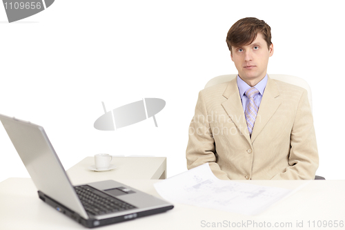 Image of Young serious person on a workplace